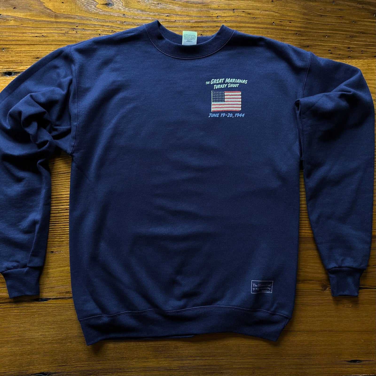 Front of The Great Maraianas Turkey Shoot Crewneck Sweatshirt  from The History List store