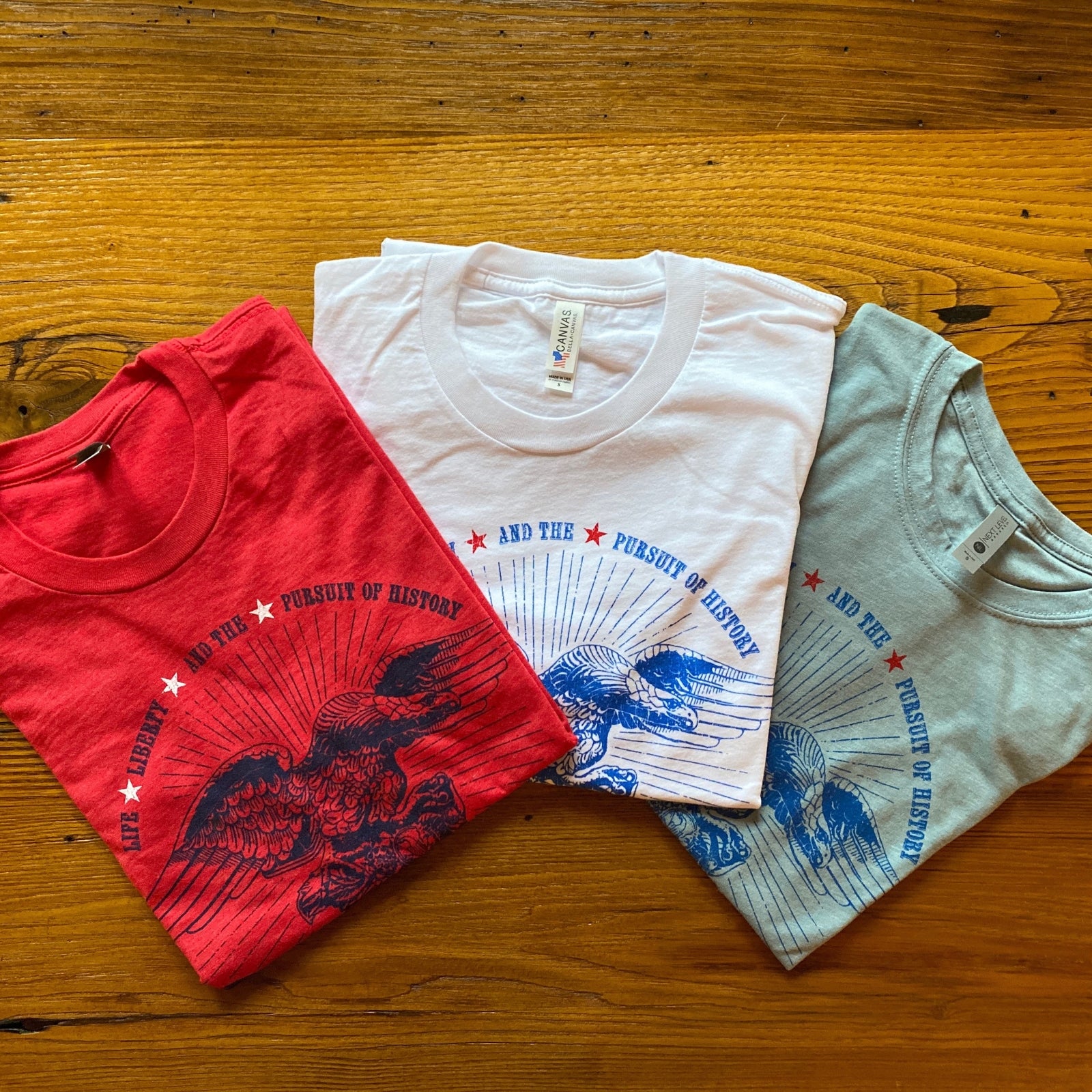 All colors of the "Life, liberty, and the pursuit of history" T-Shirt from The History List store