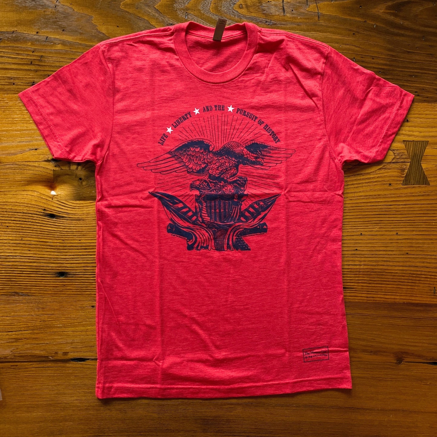 Light red heather of the "Life, liberty, and the pursuit of history" T-Shirt from The History List store