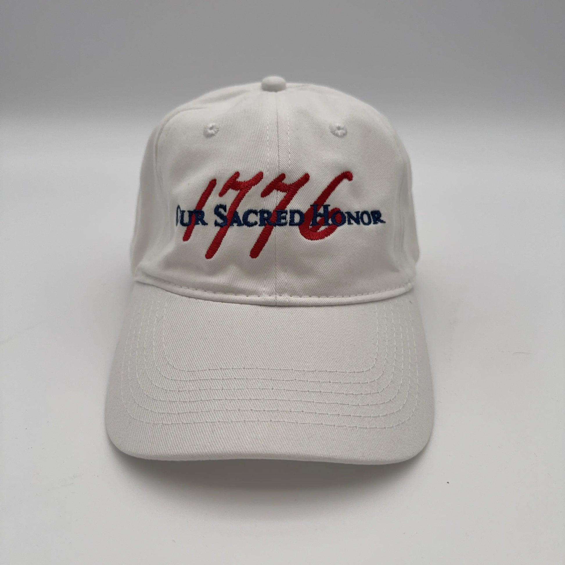 Front of white Embroidered "Our Sacred Honor" Declaration of Independence 1776 cap from The History List Store