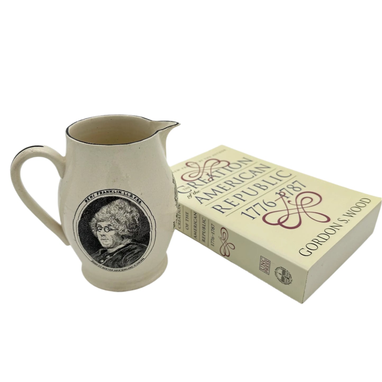 Small creamware pitcher with George Washington and Benjamin Franklin