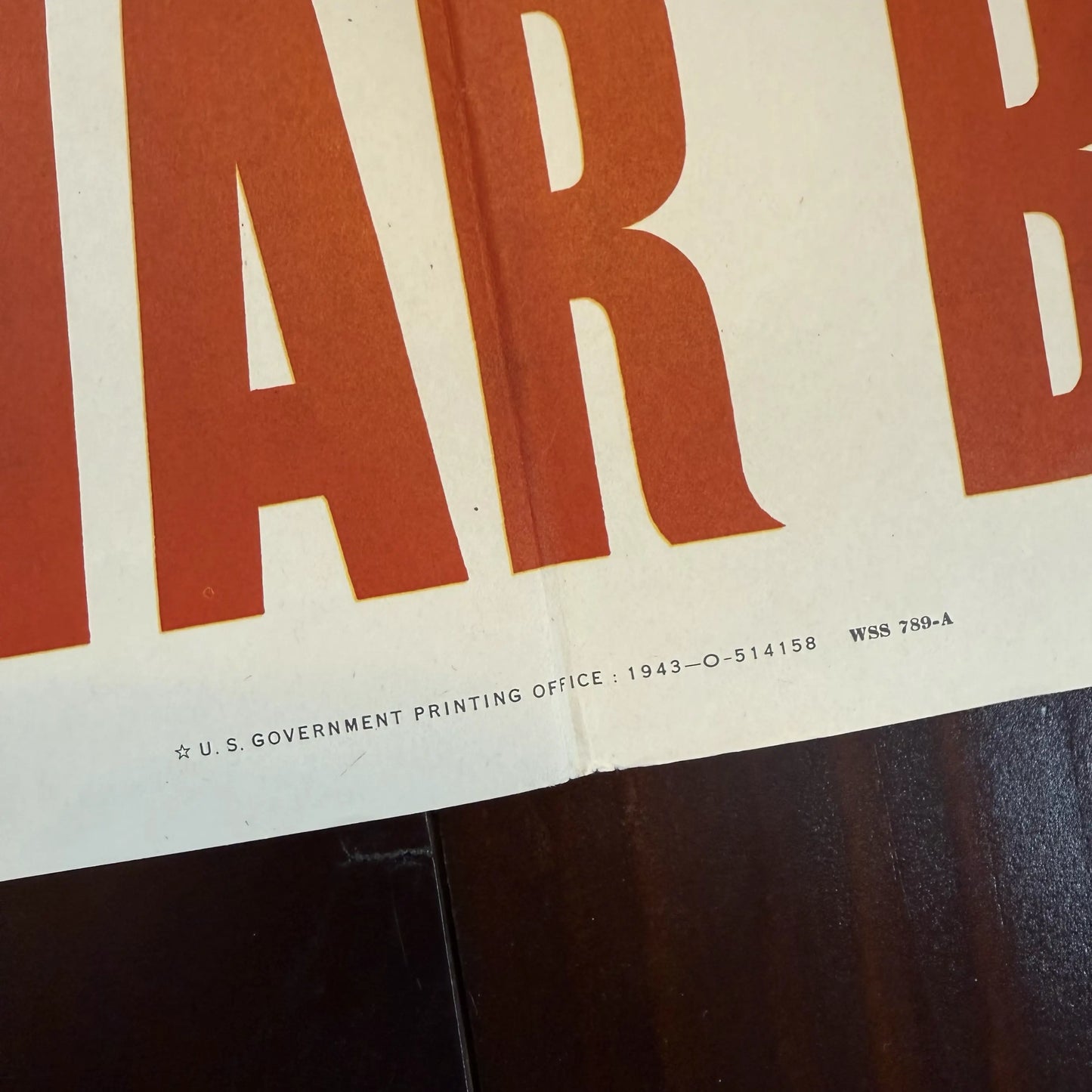 WWII War Bond drive materials, including "For Freedom's Sake" poster, sign, ad