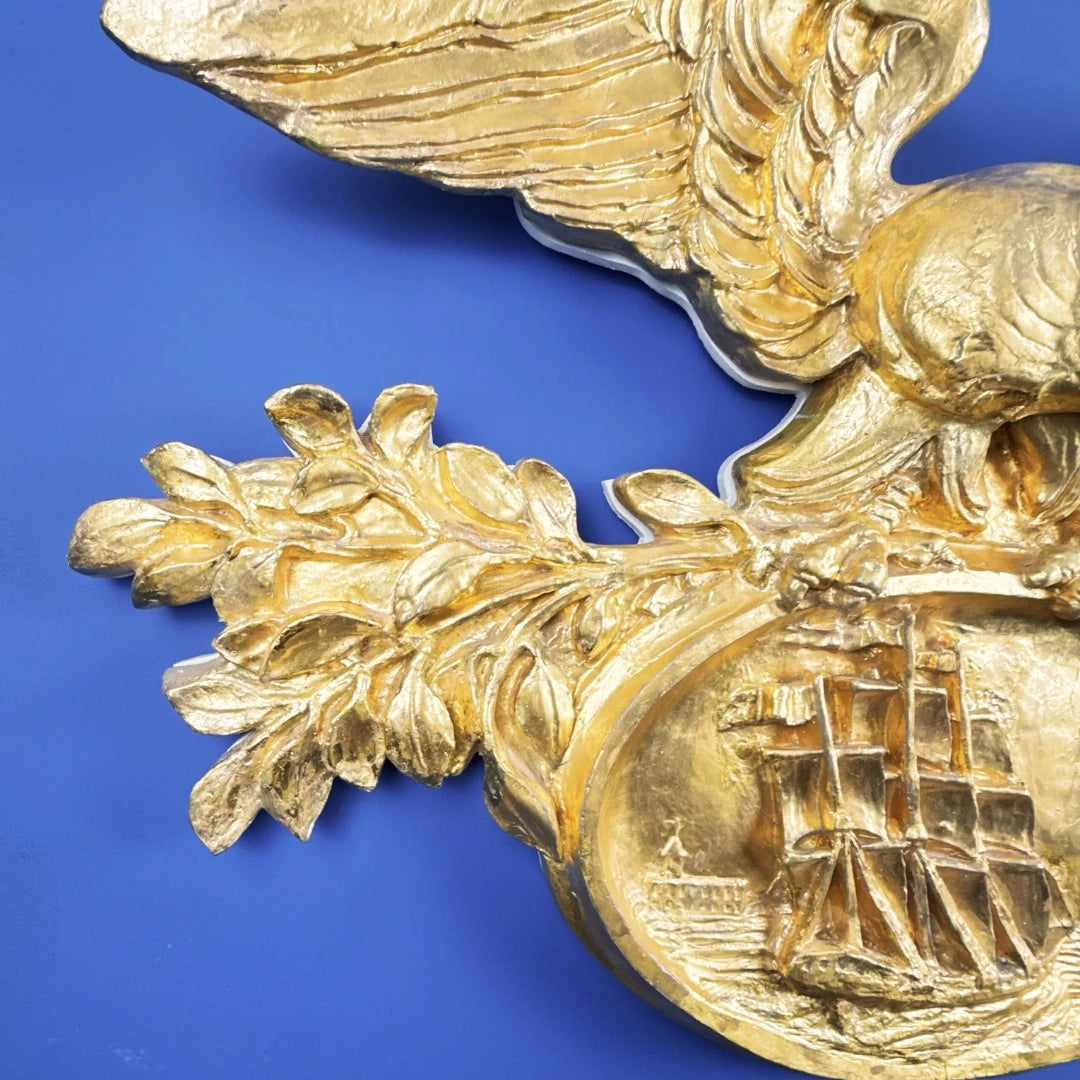 Carved gold leaf eagle with sailing ship — 42" wide — One of a kind