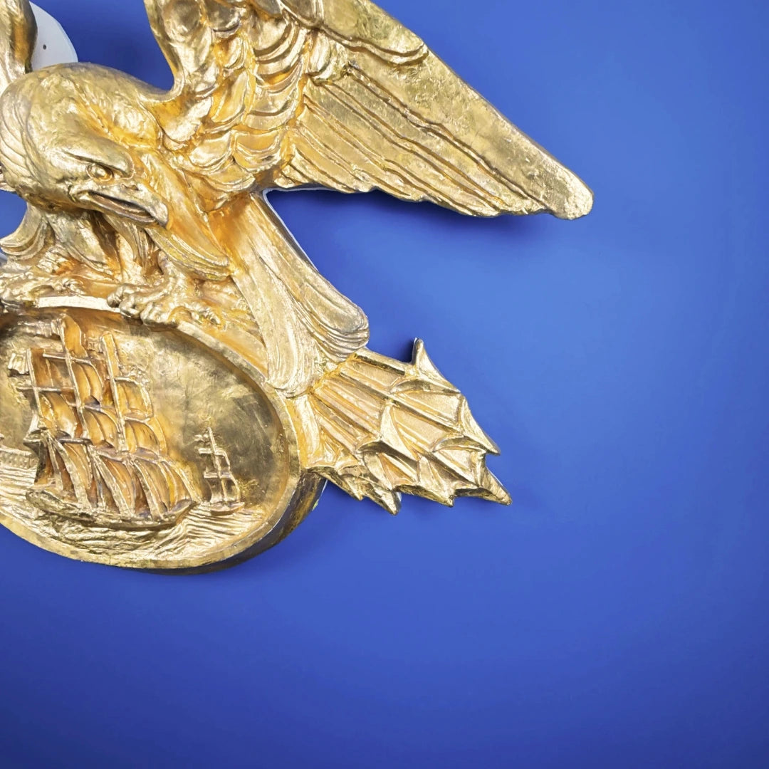 Carved gold leaf eagle with sailing ship — 42" wide — One of a kind