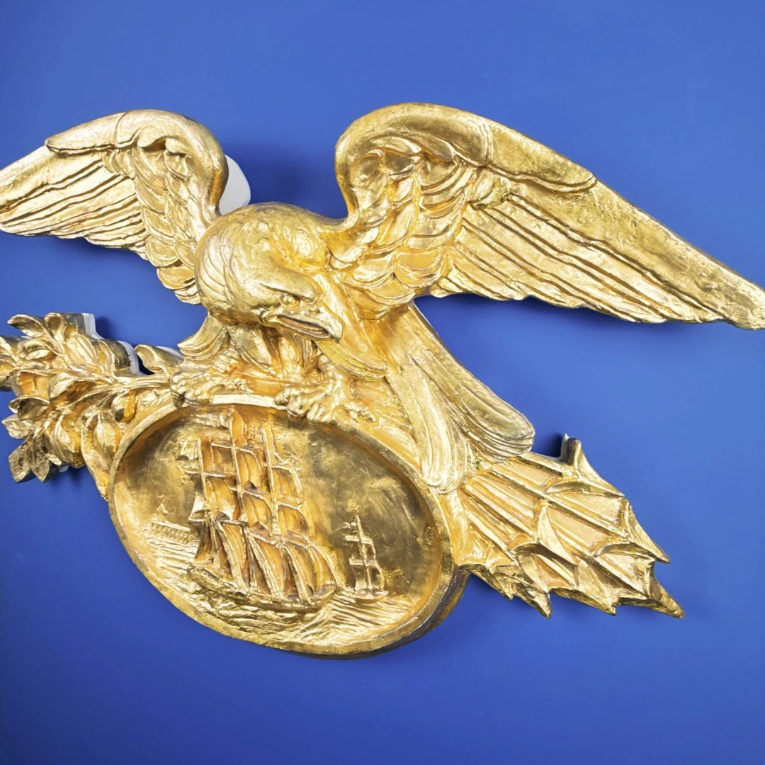 Carved gold leaf eagle with sailing ship — 42" wide — One of a kind