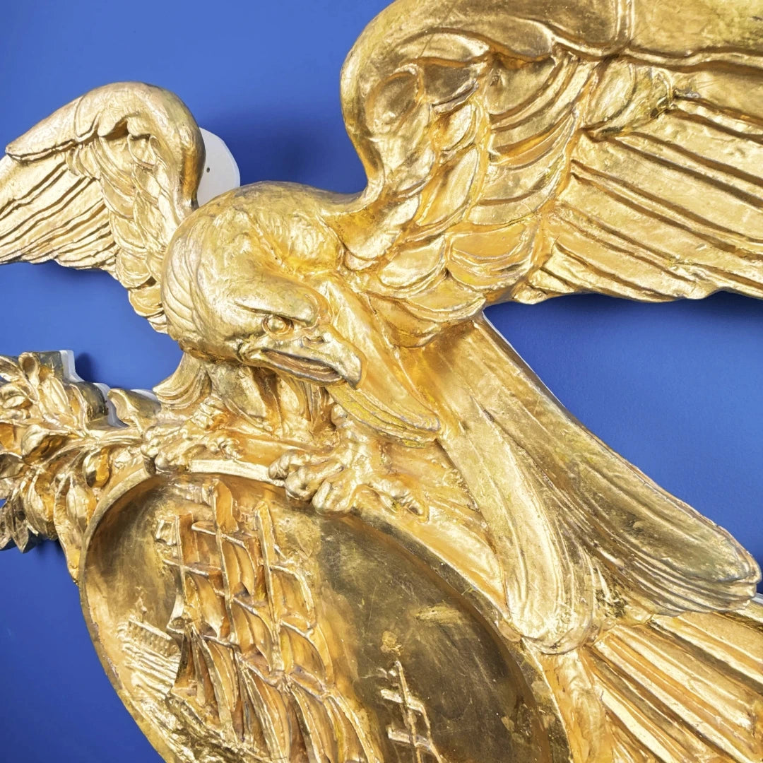 Carved gold leaf eagle with sailing ship — 42" wide — One of a kind