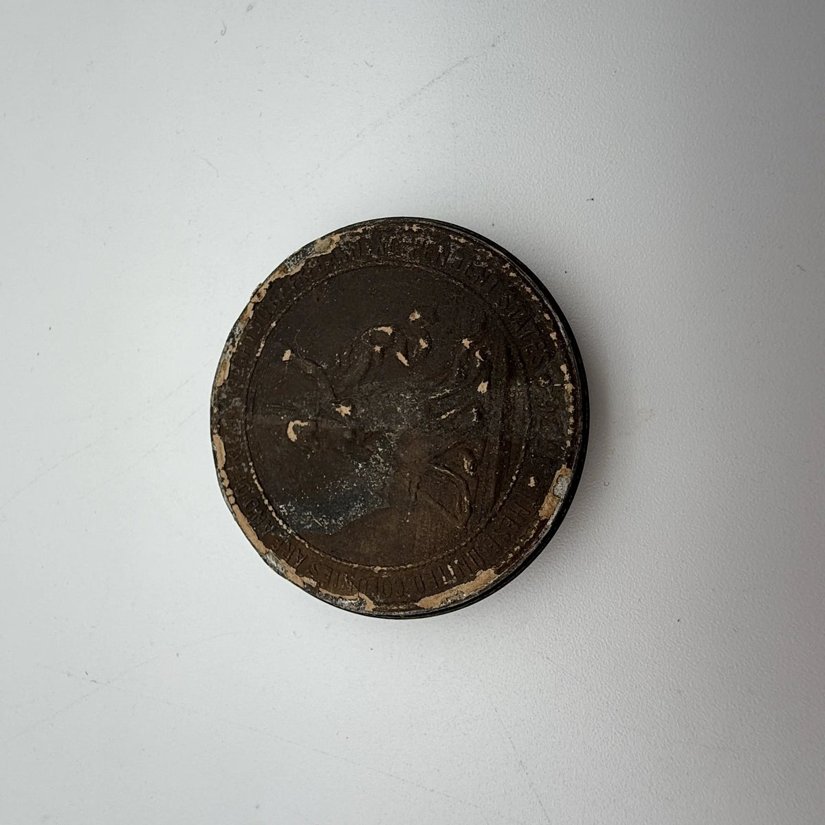 Centennial "token" with 14 small photos of Philadelphia historic sites enclosed