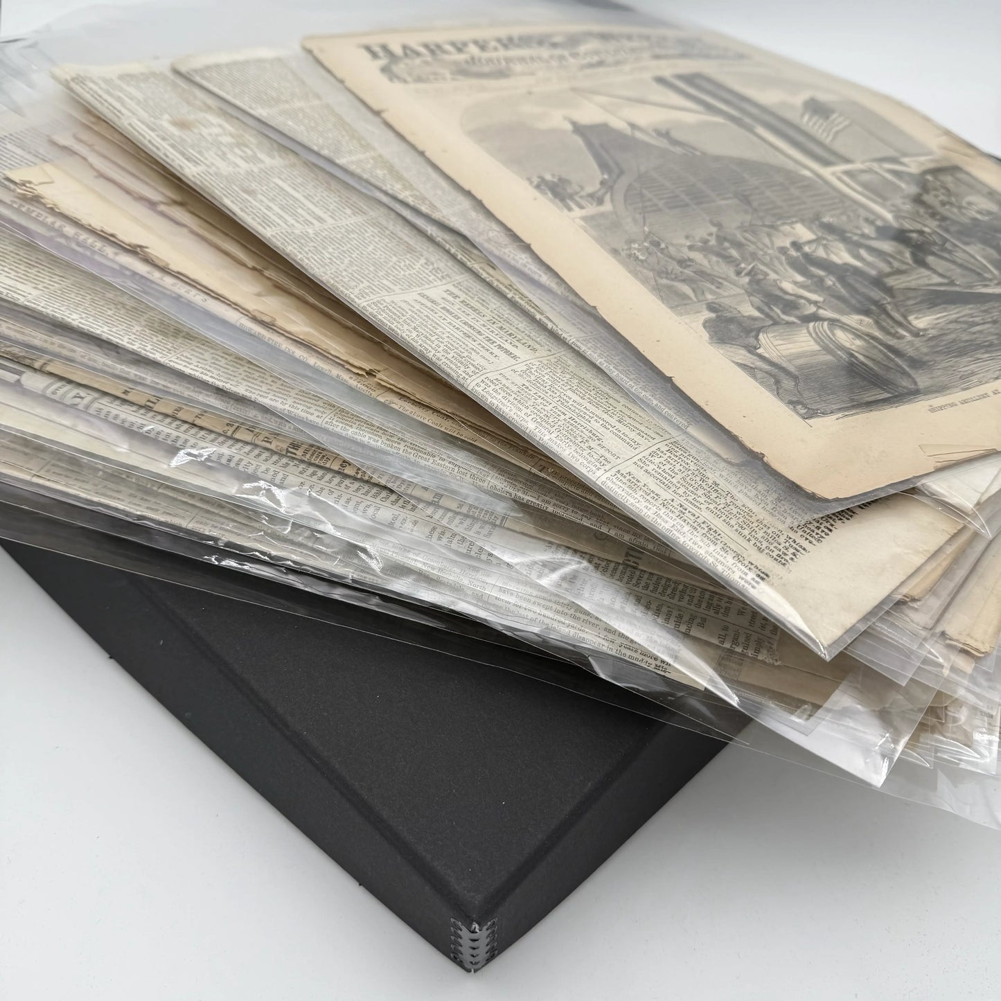 Collection of 34 Civil War Daily Newspapers and Weeklies in an archival box — 1855 - 1865