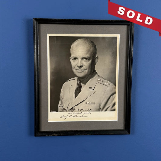 Dwight D. Eisenhower in military dress — Framed signed, inscribed photograph