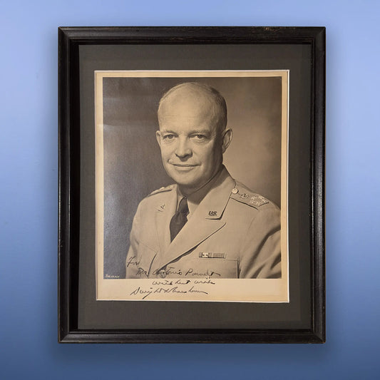 Dwight D. Eisenhower in military dress — Framed signed, inscribed photograph