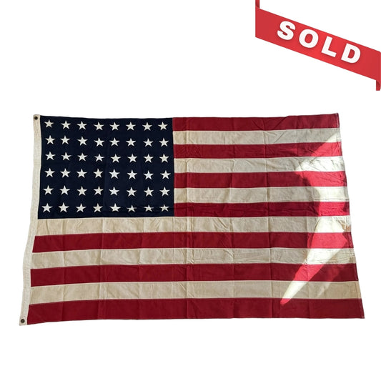 48-star cotton flag with sewn stars and stripes — a little less than 4' x 6'