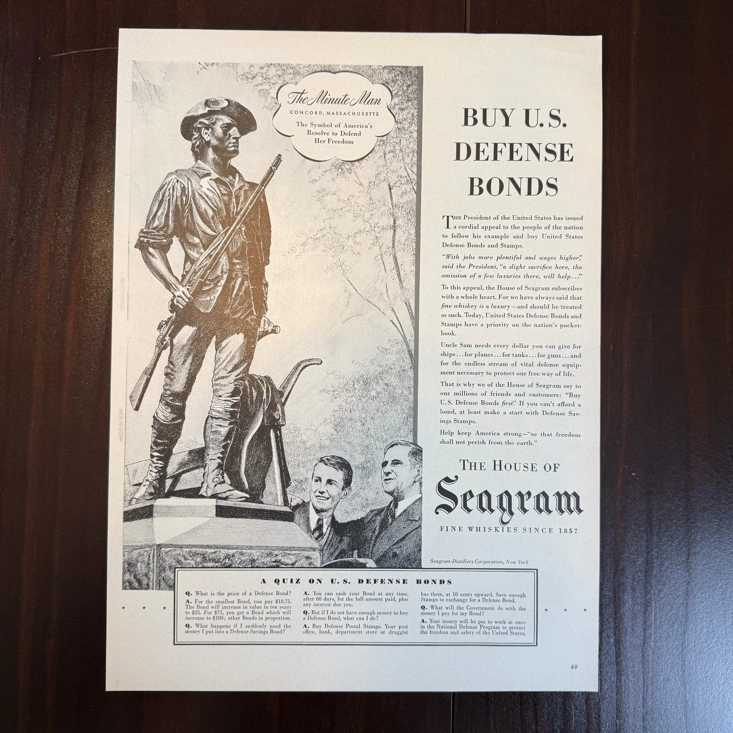 WWII War Bond drive materials, including "For Freedom's Sake" poster, sign, ad