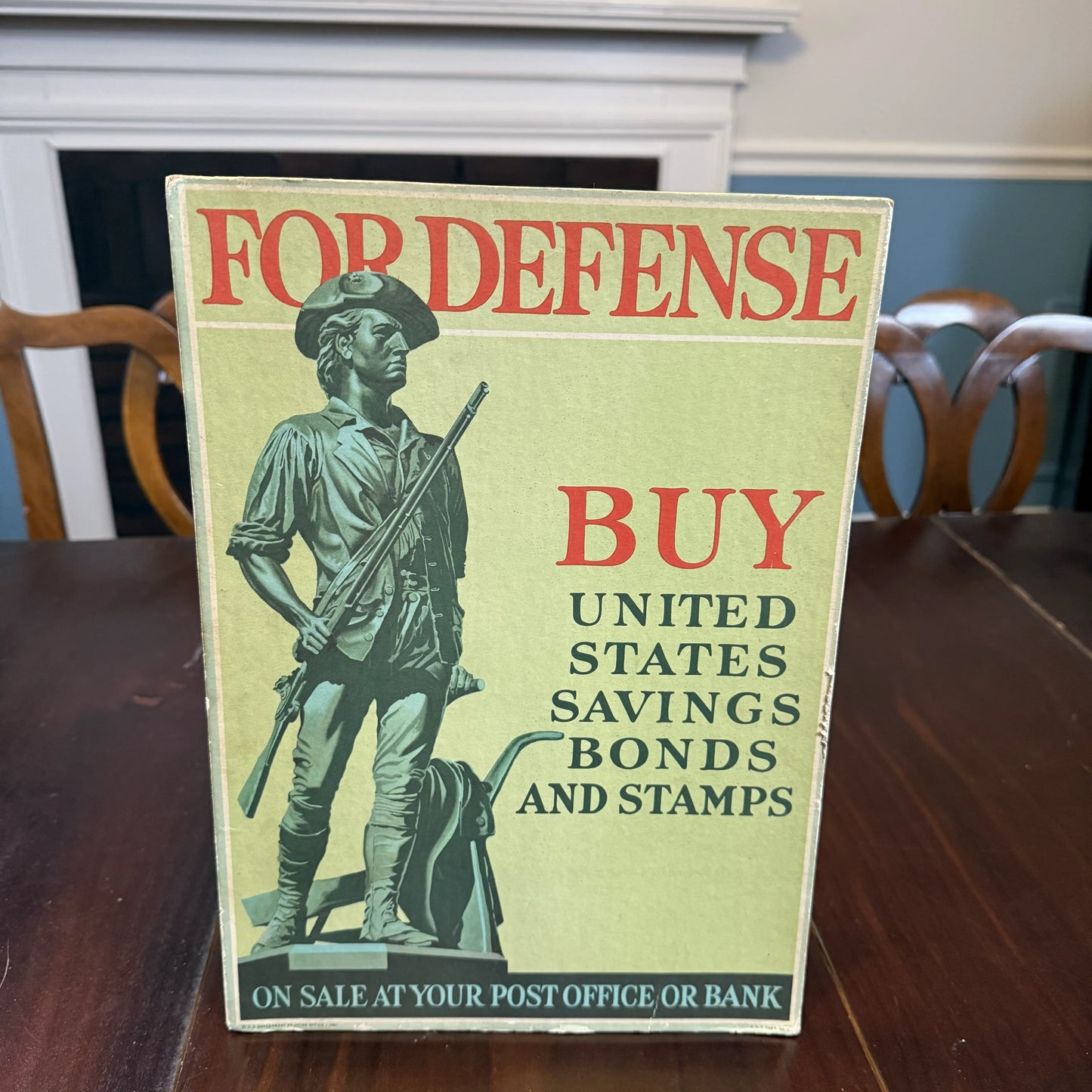 WWII War Bond drive materials, including "For Freedom's Sake" poster, sign, ad