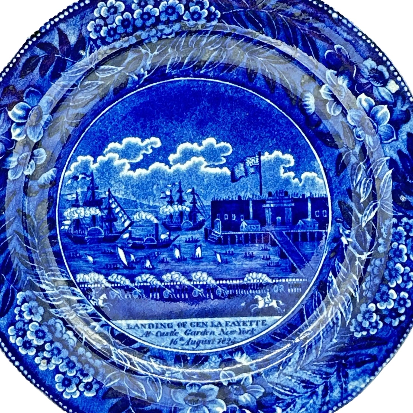 Historical Staffordshire blue plate showing the landing of Gen. Lafayette at Castle Garden in New York, early 19th c.