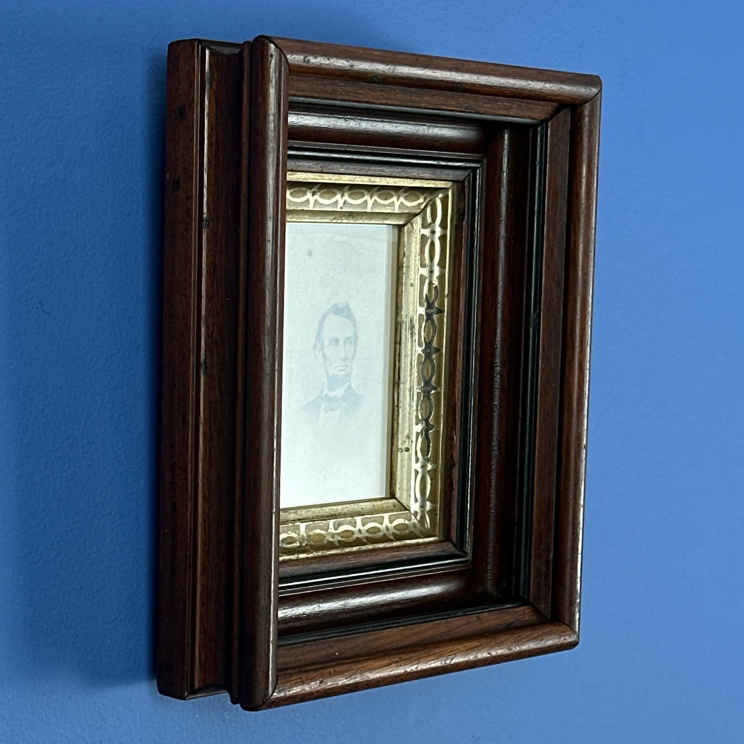 A carte de visite (CDV) of President Lincoln in a large solid wood frame