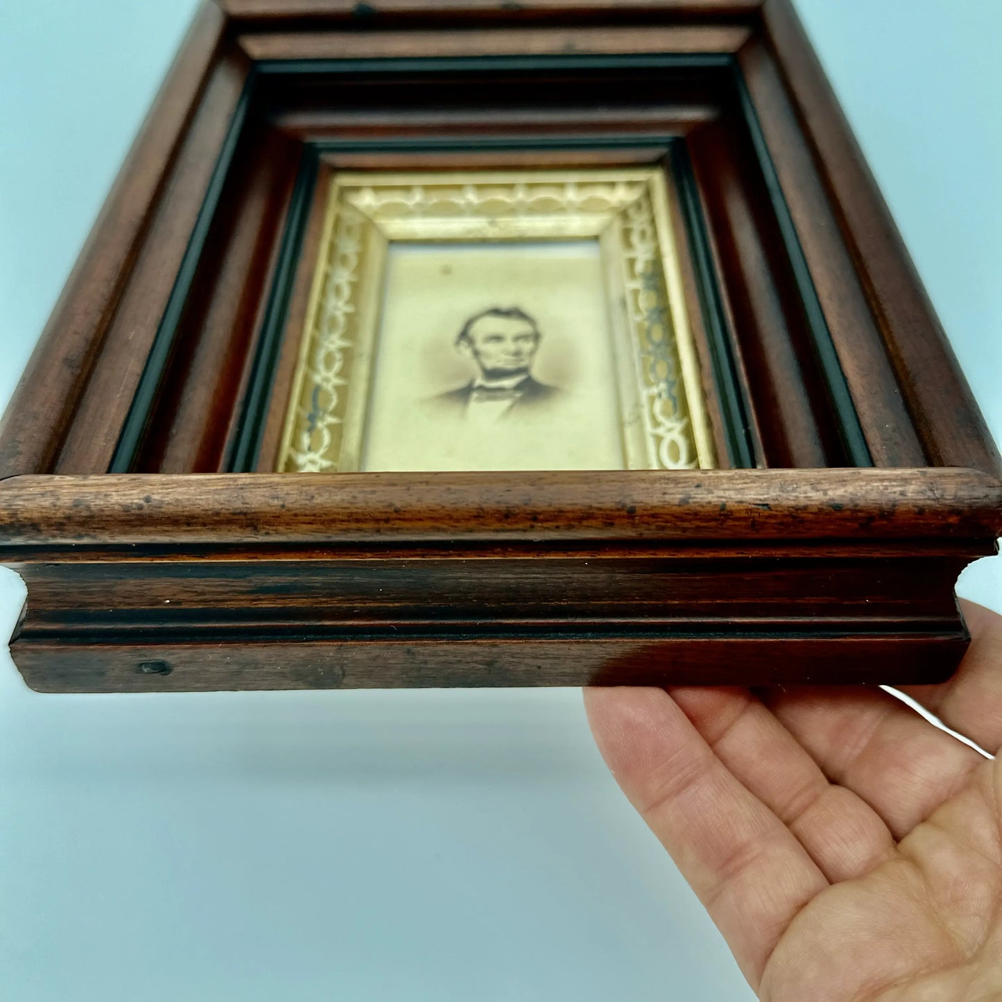 A carte de visite (CDV) of President Lincoln in a large solid wood frame