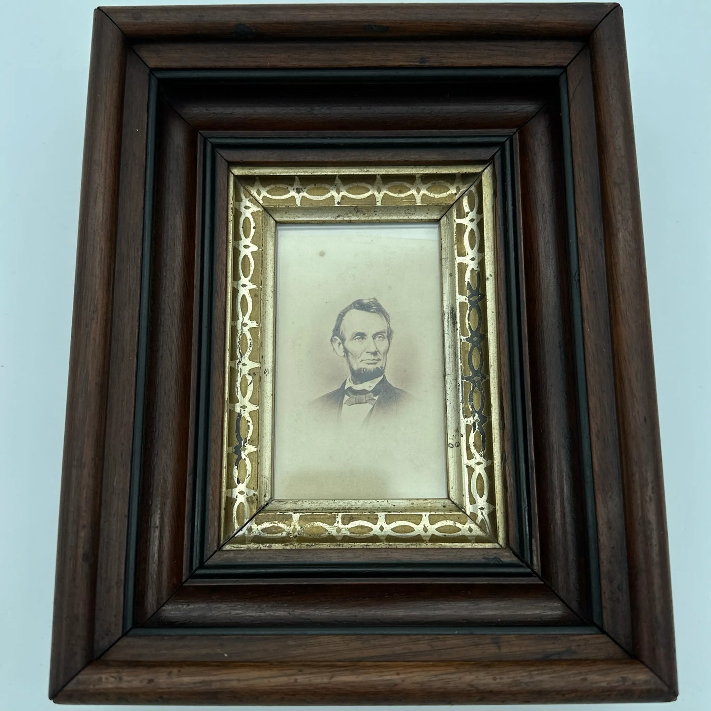 A carte de visite (CDV) of President Lincoln in a large solid wood frame