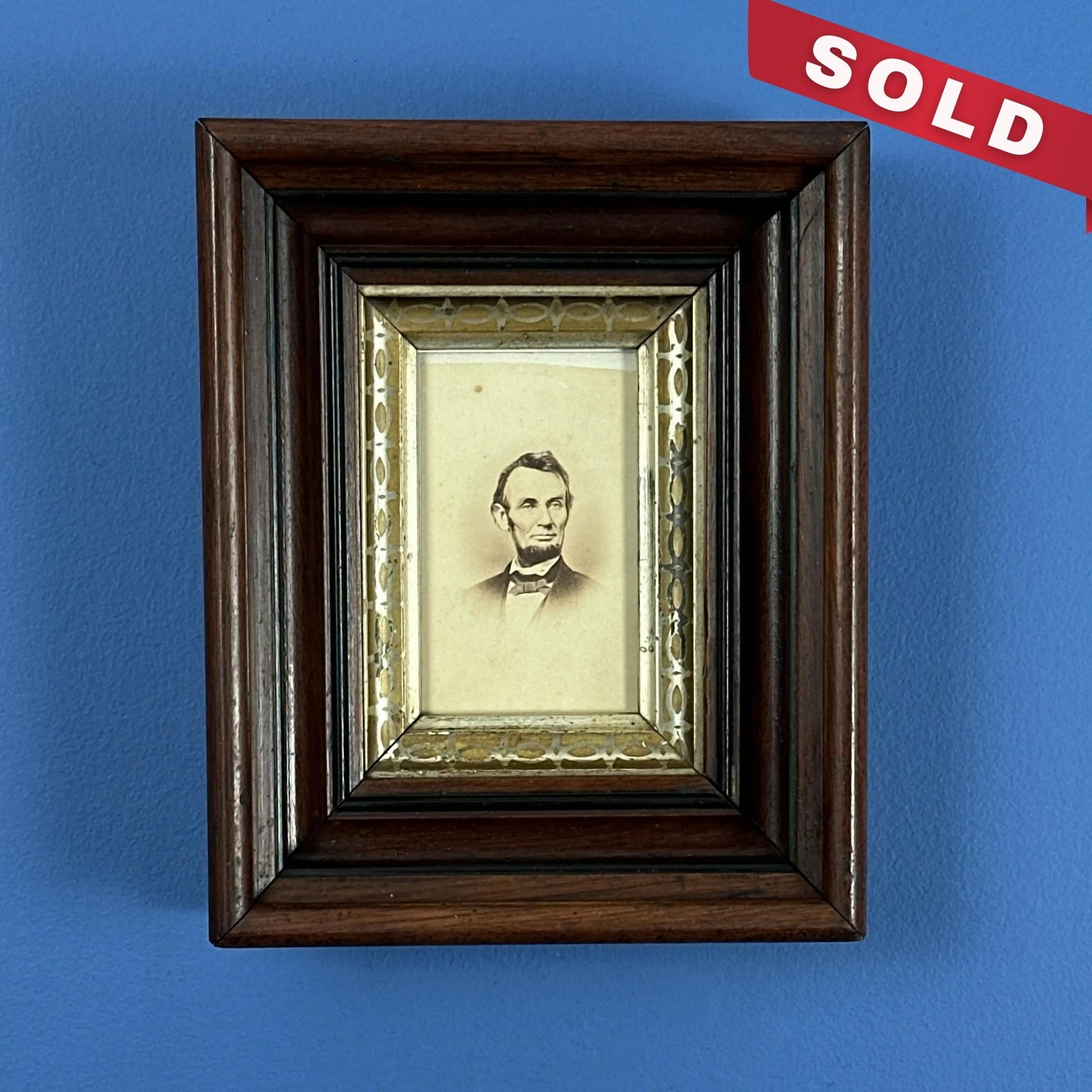 A carte de visite (CDV) of President Lincoln in a large solid wood frame