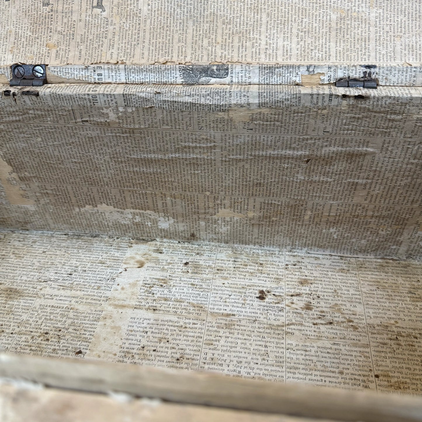 Small document trunk lined with papers from 1834 and 1838