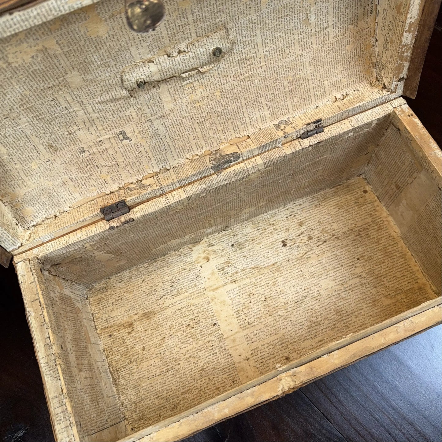 Small document trunk lined with papers from 1834 and 1838