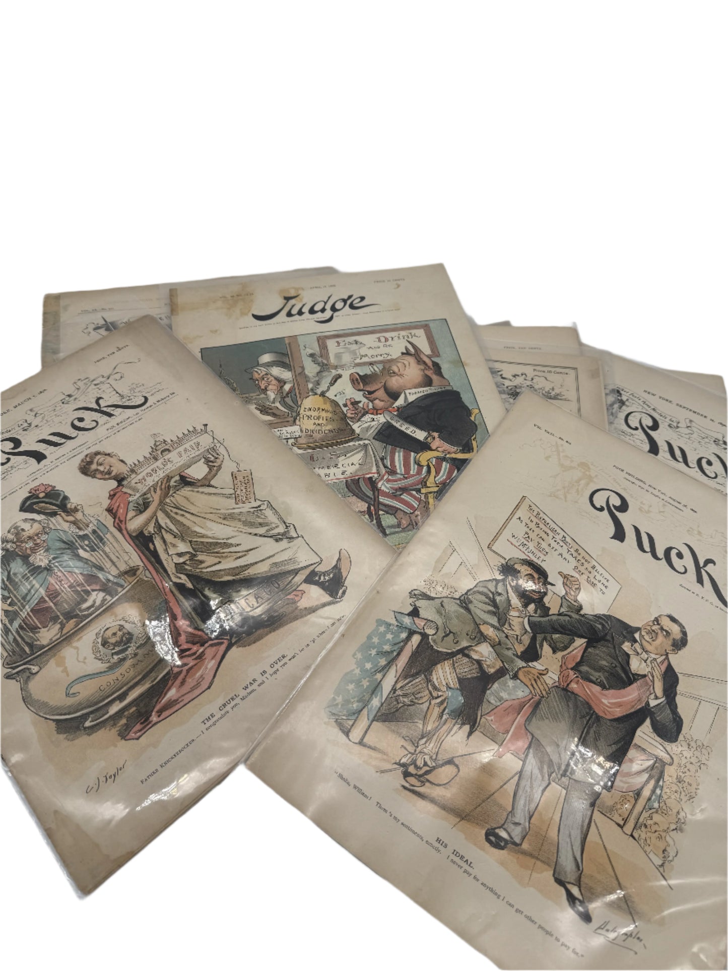 "Puck" and "Judge" Magazines — 1881 - 1905 — Fourteen issues in an archival box