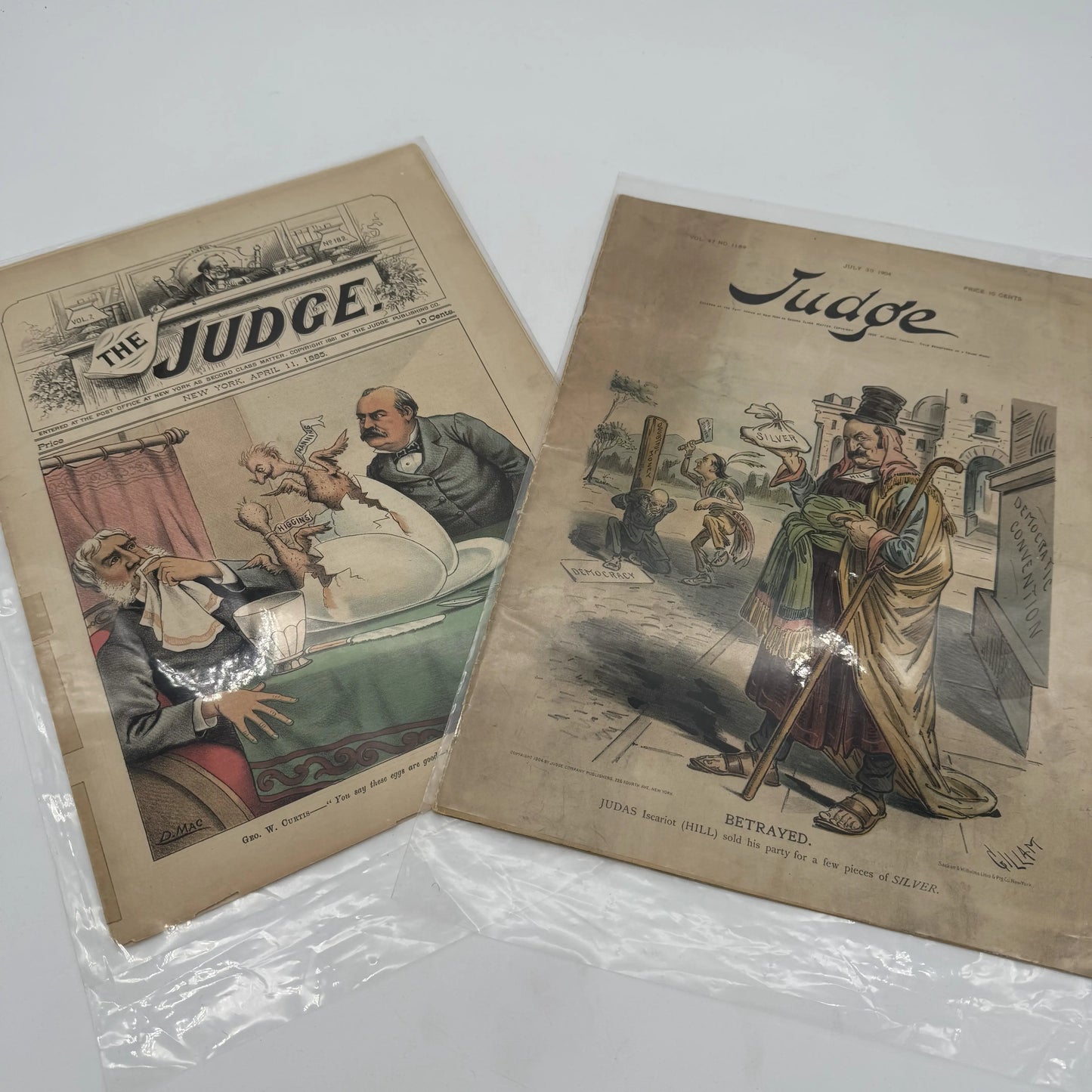 "Puck" and "Judge" Magazines — 1881 - 1905 — Fourteen issues in an archival box