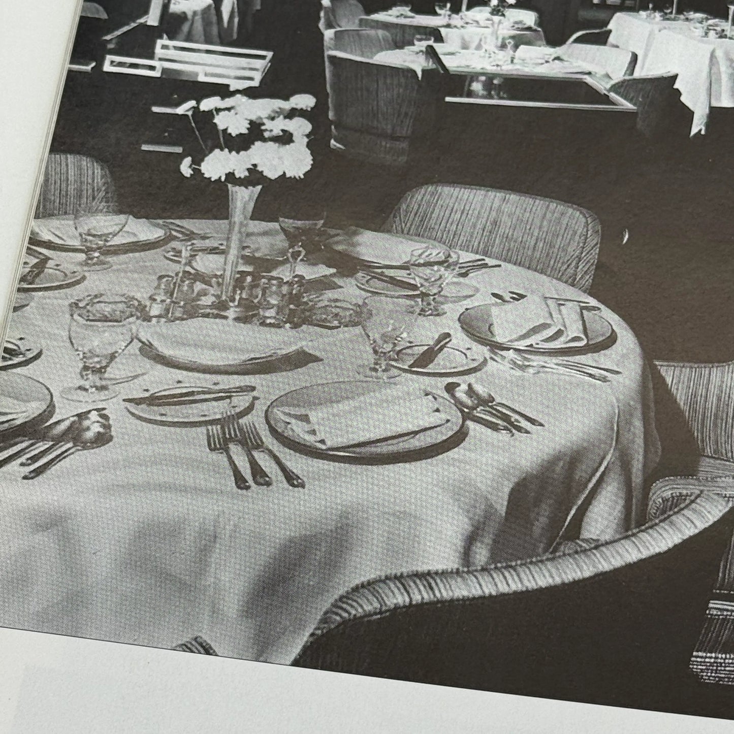 SS United States place setting with book, documents, stock certificate