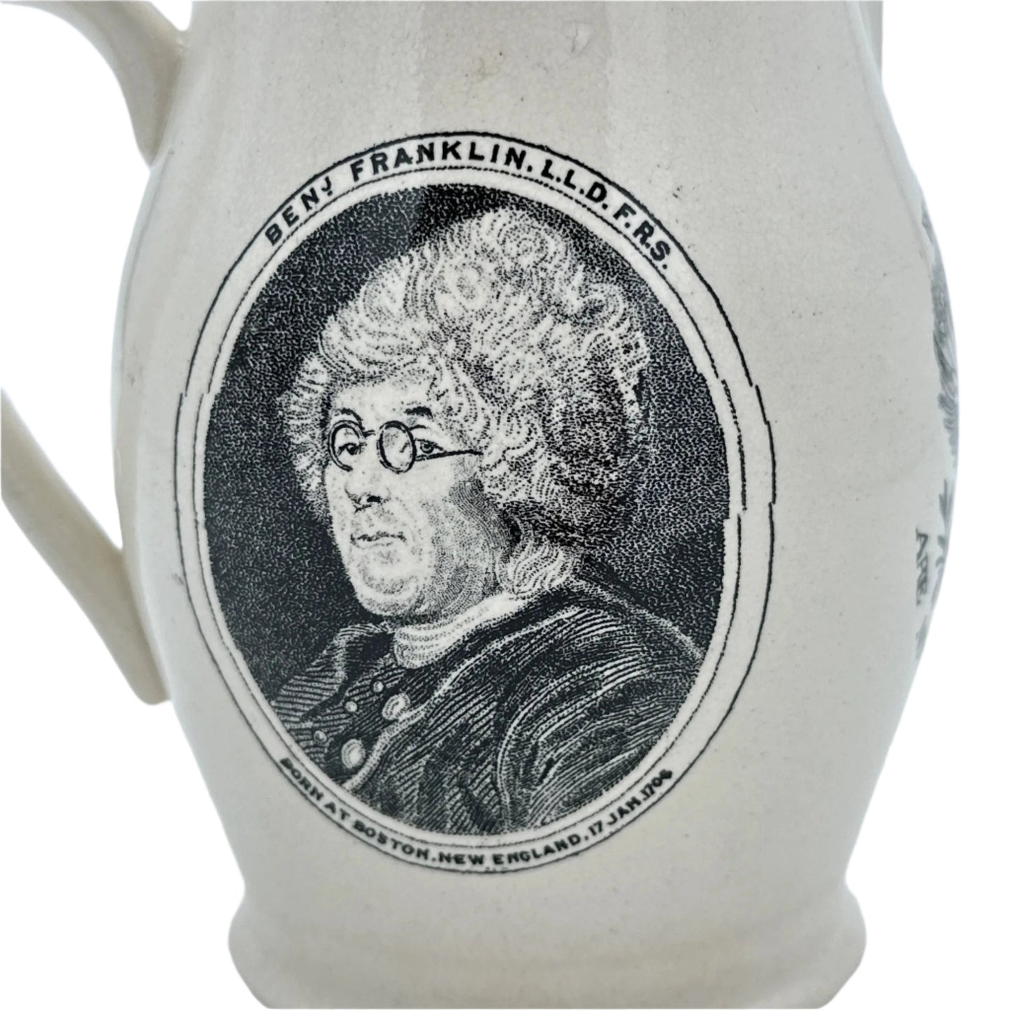 Small creamware pitcher with George Washington and Benjamin Franklin