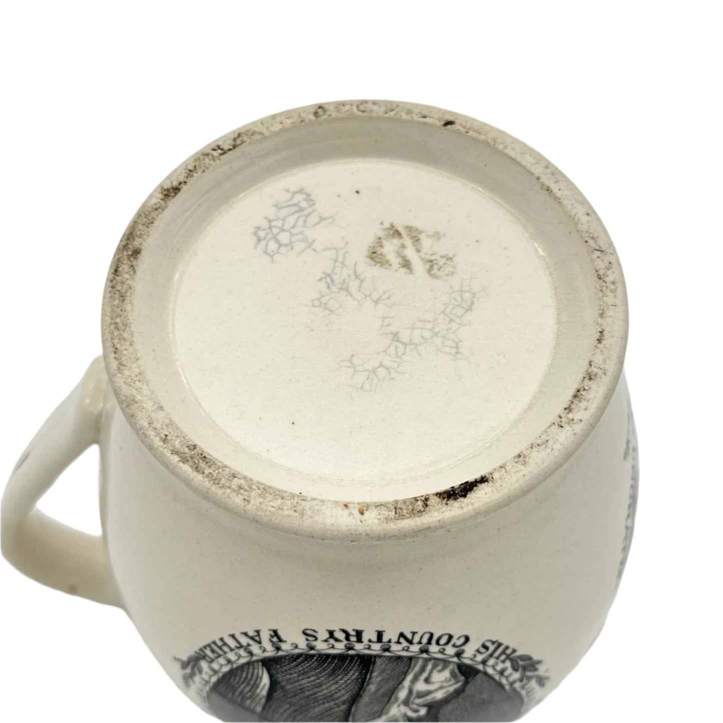 Small creamware pitcher with George Washington and Benjamin Franklin