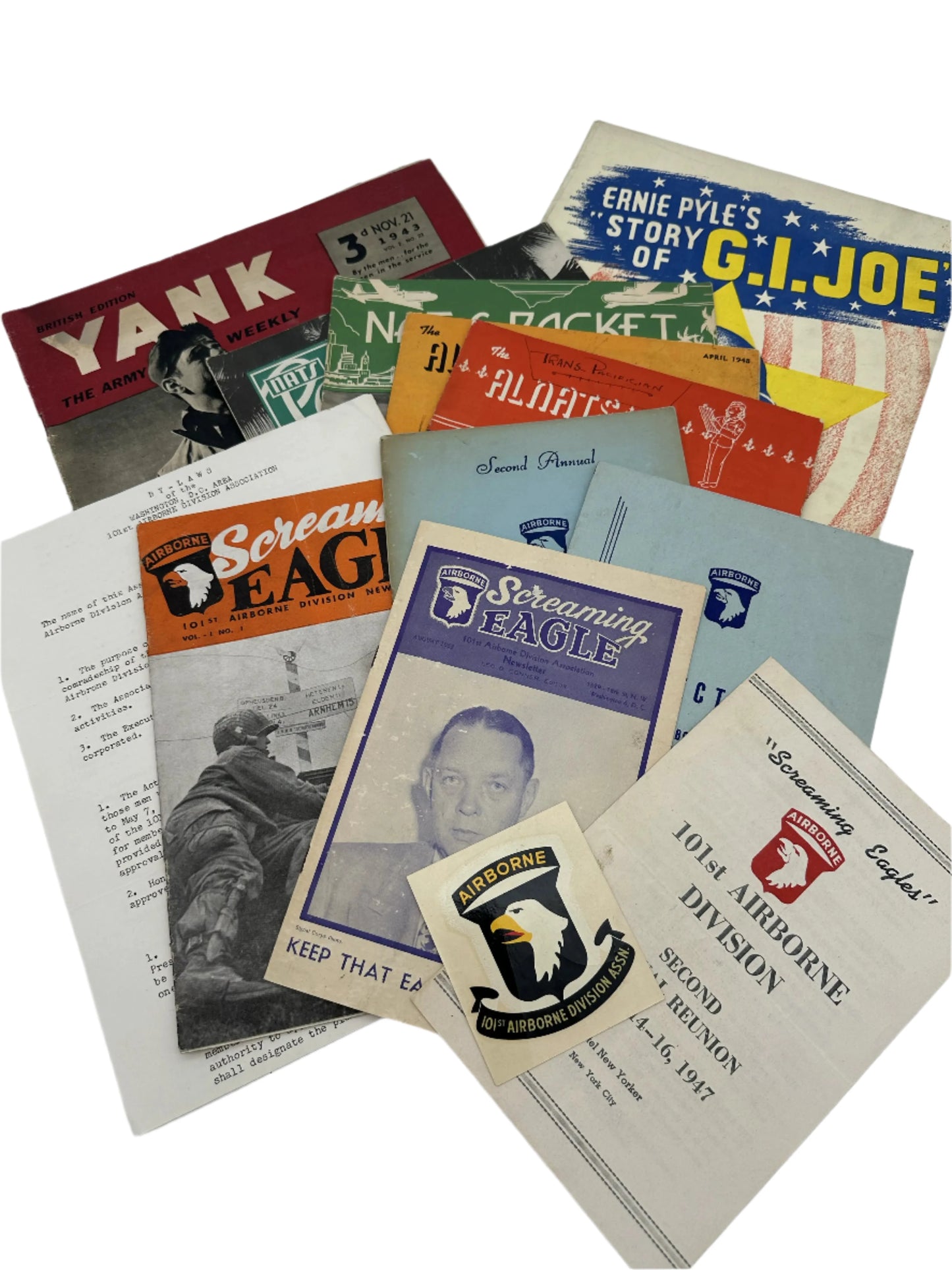 Extensive collection of WWII items — Includes the 101st, Victory War Maps, large book on British and other planes from WWII, Nats Packet, Alnats Magazine, Yank Magazine, and Show programs