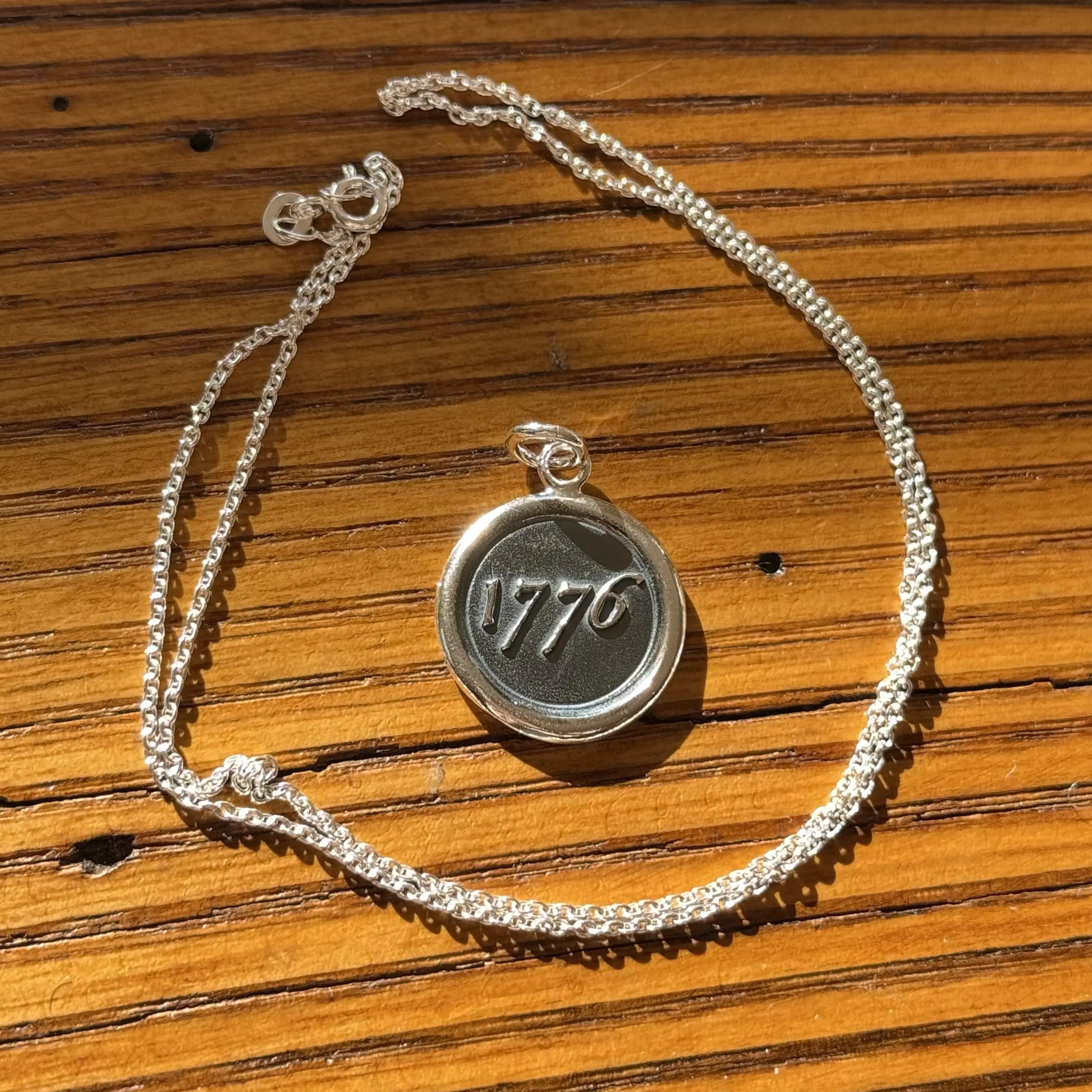 1776 Revolutionary sterling silver charm and chain made by hand in New England from the History List Store.
