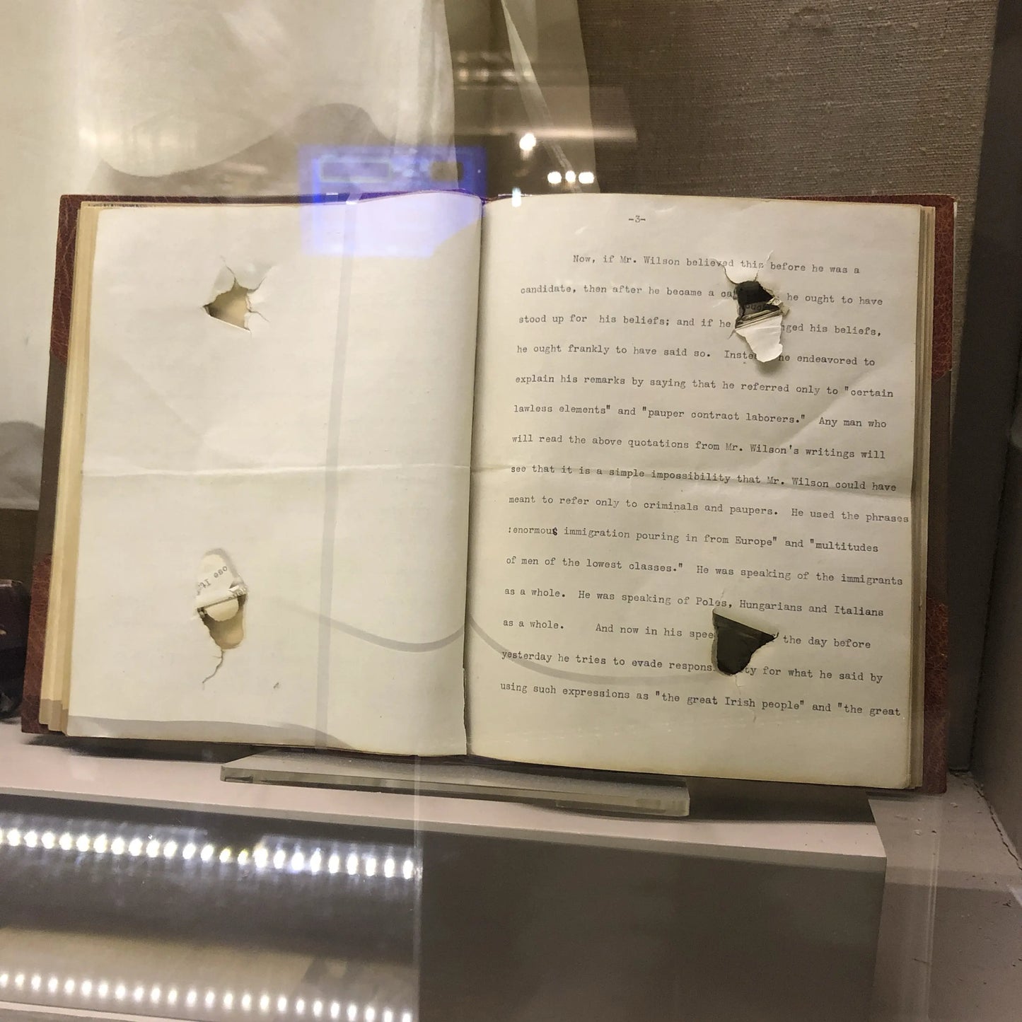 Photo taken by Lee, the recreated boyhood home of Roosevelt in New York that show the speech (now bound), that slowed the bullet when Roosevelt was shot as he was arriving to give a speech in Milwaukee.