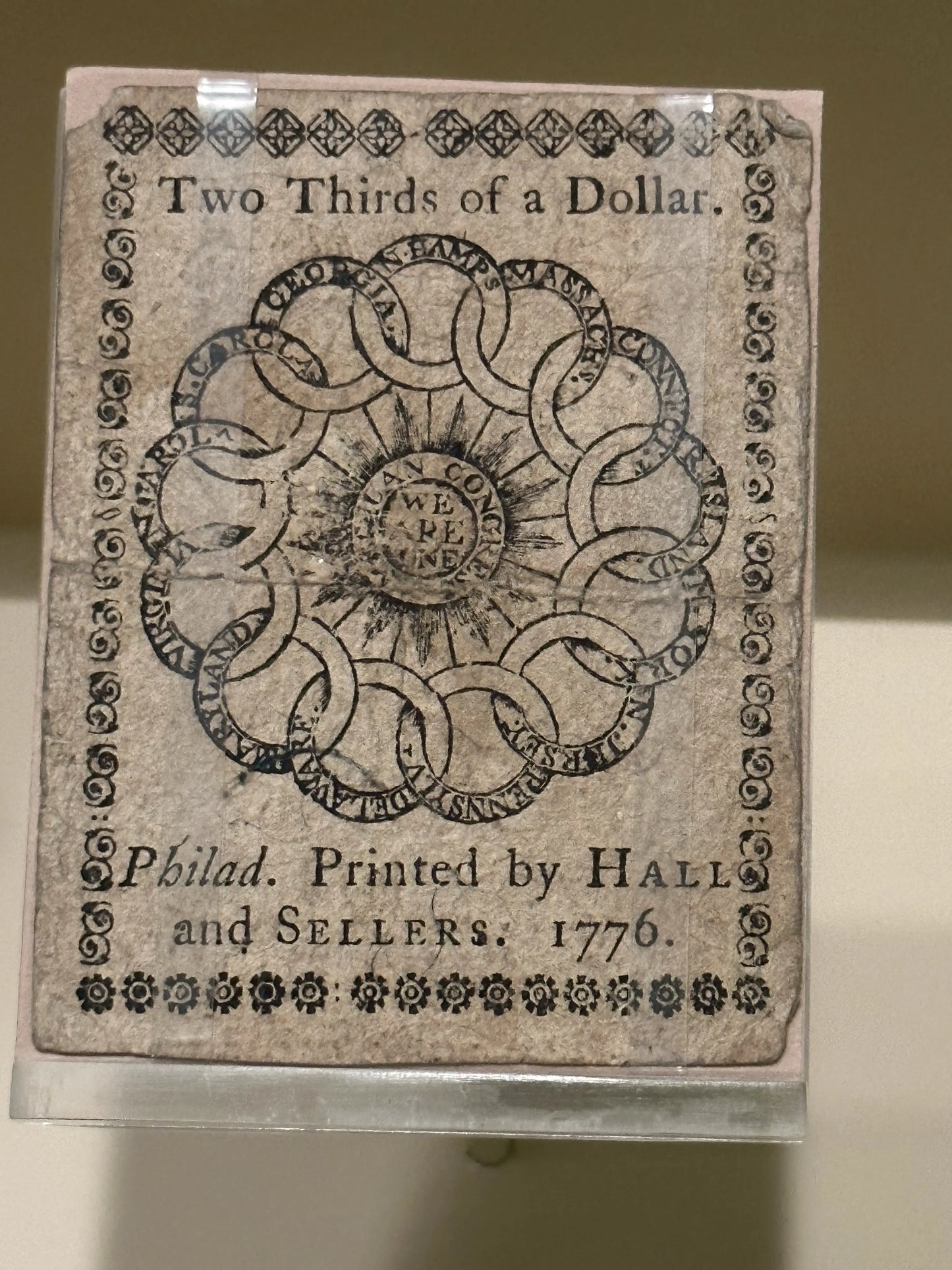 Currency with the We are One image