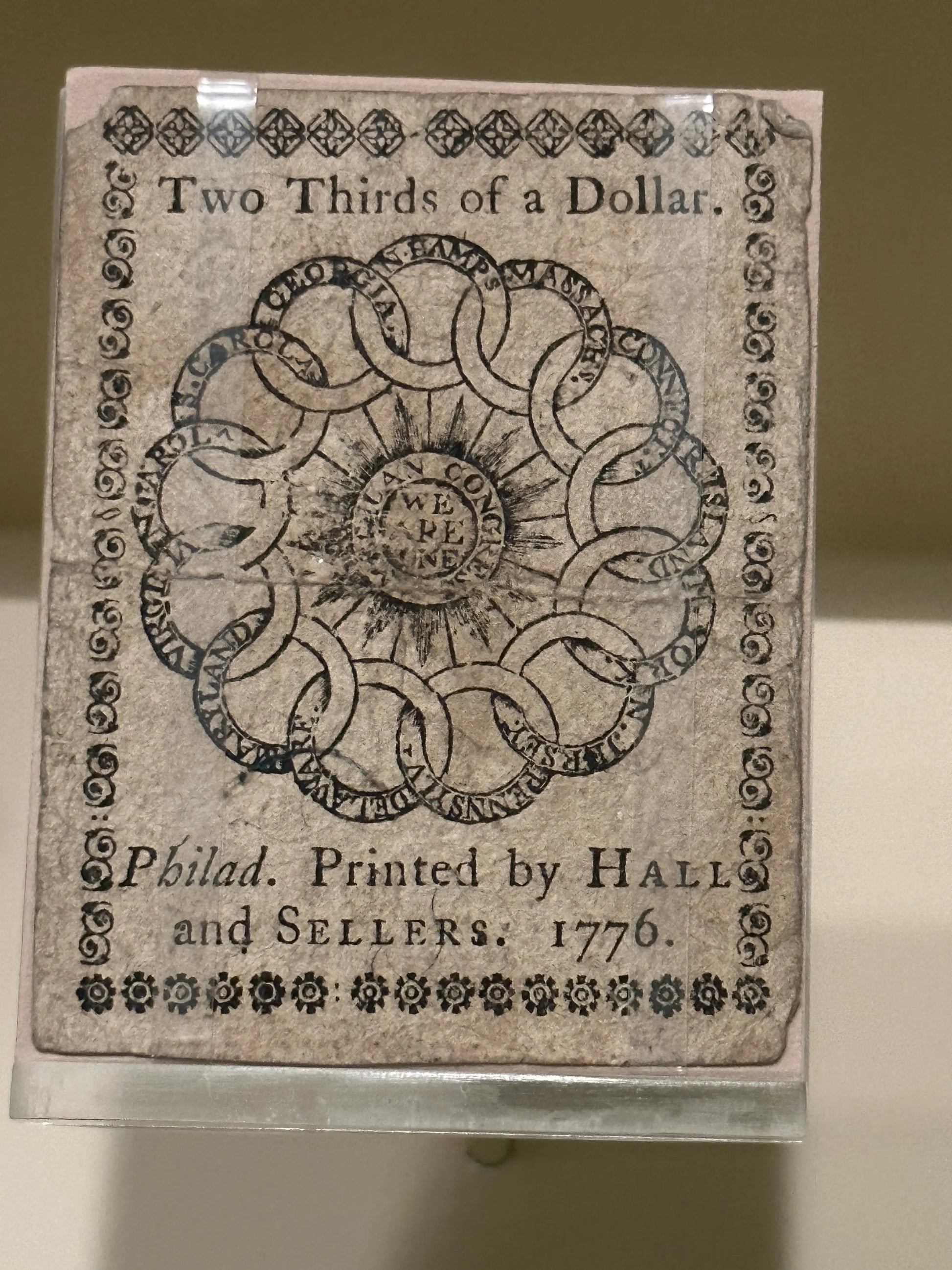 Currency with the We are One image