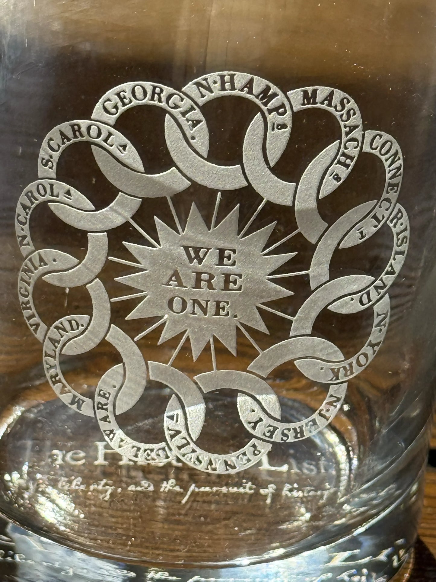 Close up details of the “We are one” Rock glasses and cork coaster — Made in America from The History List Store.