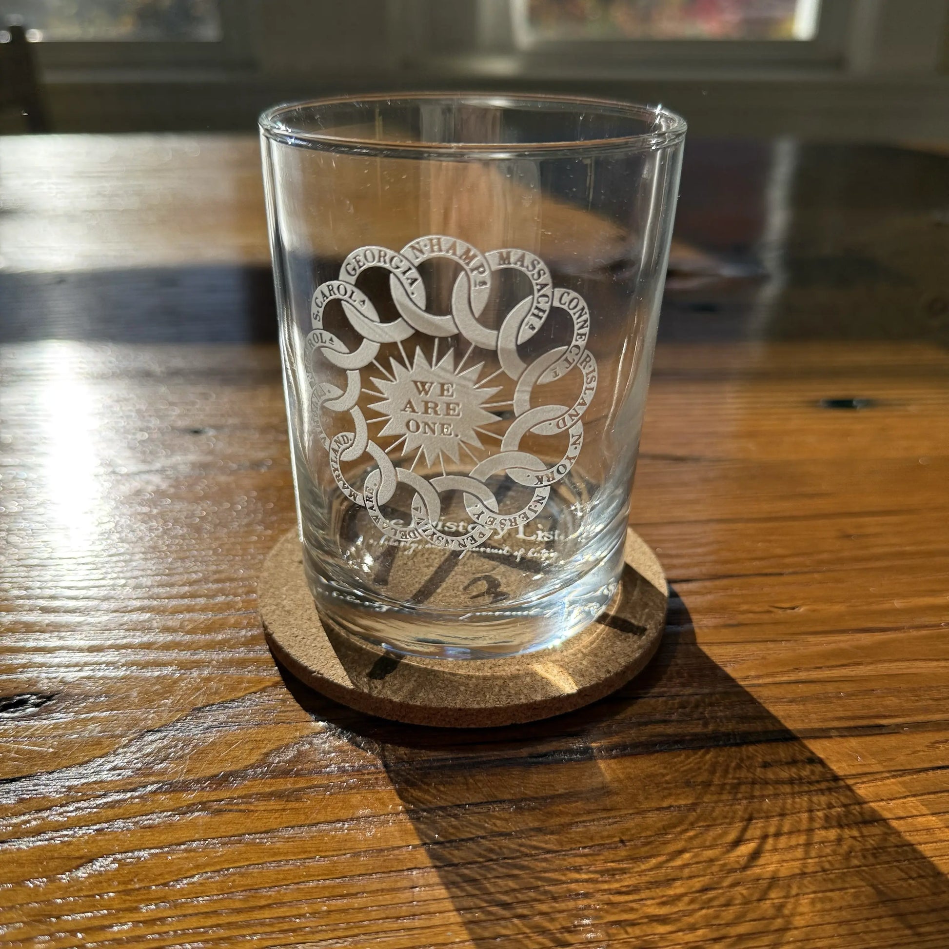 Close up details of the “We are one” Rock glasses and cork coaster — Made in America from The History List Store.