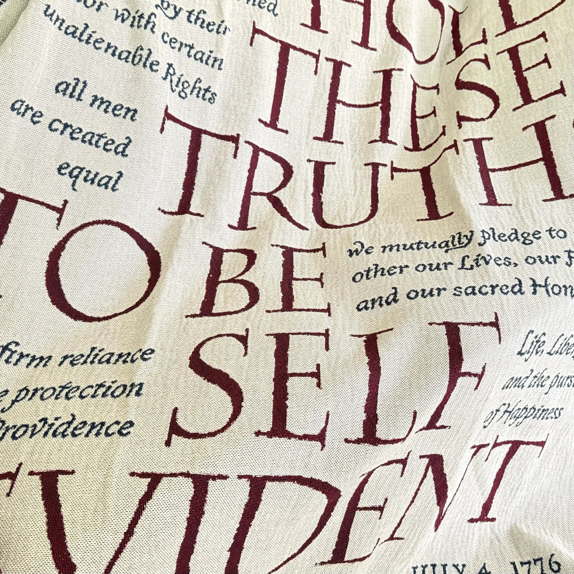 Close-up of "We hold these truths" Declaration of Independence Made in America woven blanket from The History List store