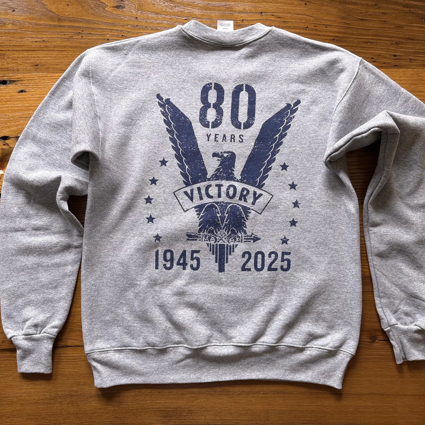 Back view of the WWII Victory 80th Anniversary Crewneck sweatshirt in Heather Grey from The History List Store.