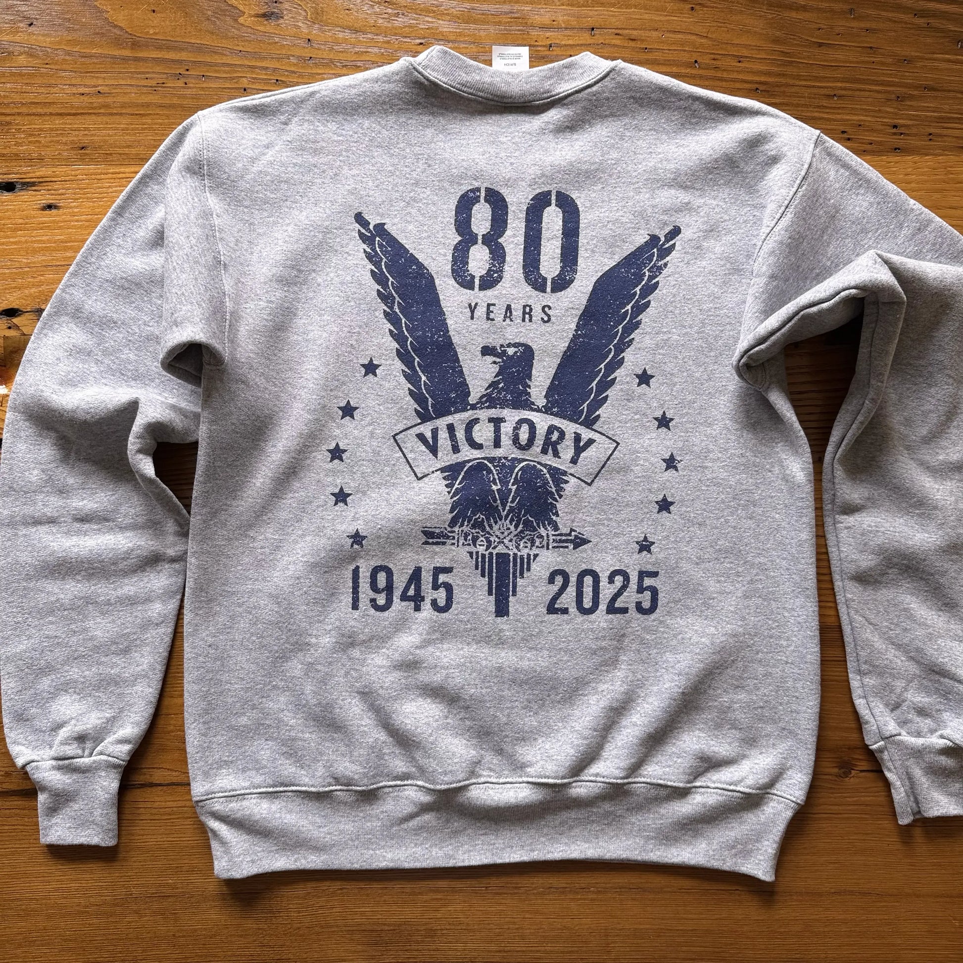 Back view of the WWII Victory 80th Anniversary Crewneck sweatshirt in Heather Grey from The History List Store.
