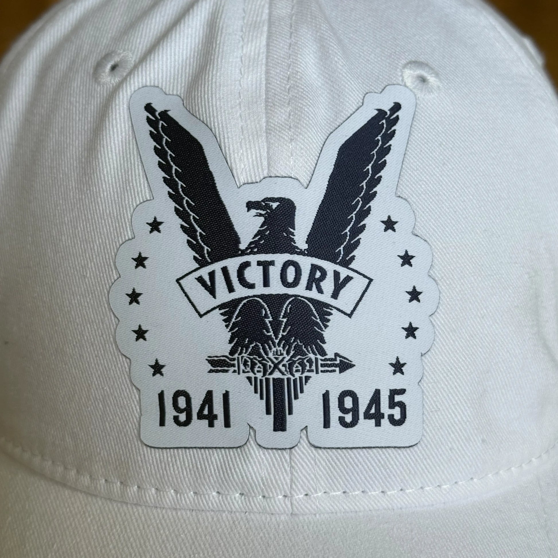 Close-up of white WWII Victory 80th Anniversary Cap from The History List store 