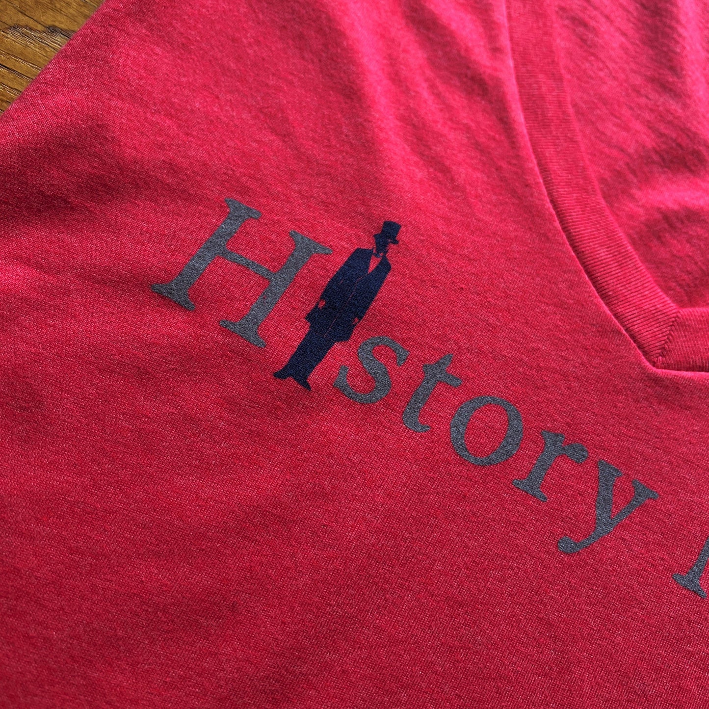 Close-up of "History Nerd" V-neck shirt with Abraham Lincoln from The History List store