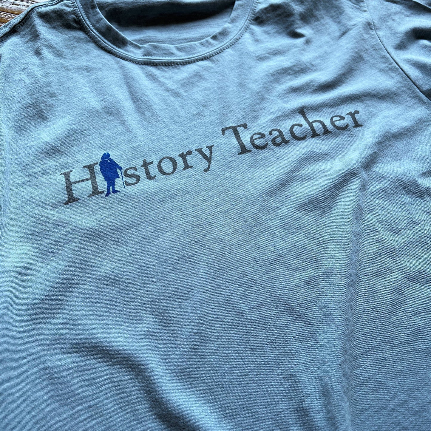 "History Teacher" T-Shirt with Ben Franklin - Light blue heather from The History List Store