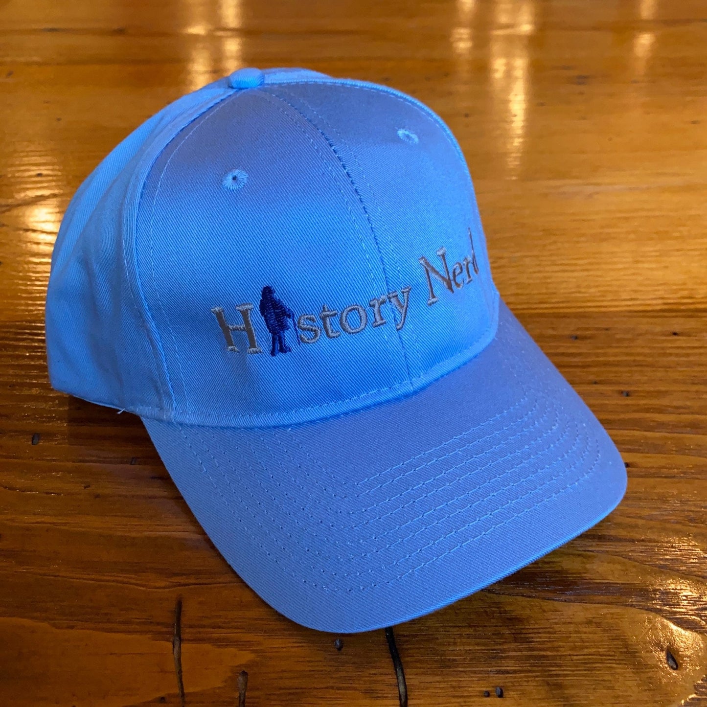 Side View - Embroidered "History Nerd" with Ben Franklin cap - Carolina blue from The History List Store