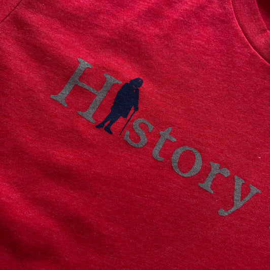 Red close-up of "History Nerd" shirt with Ben Franklin from The History List Store