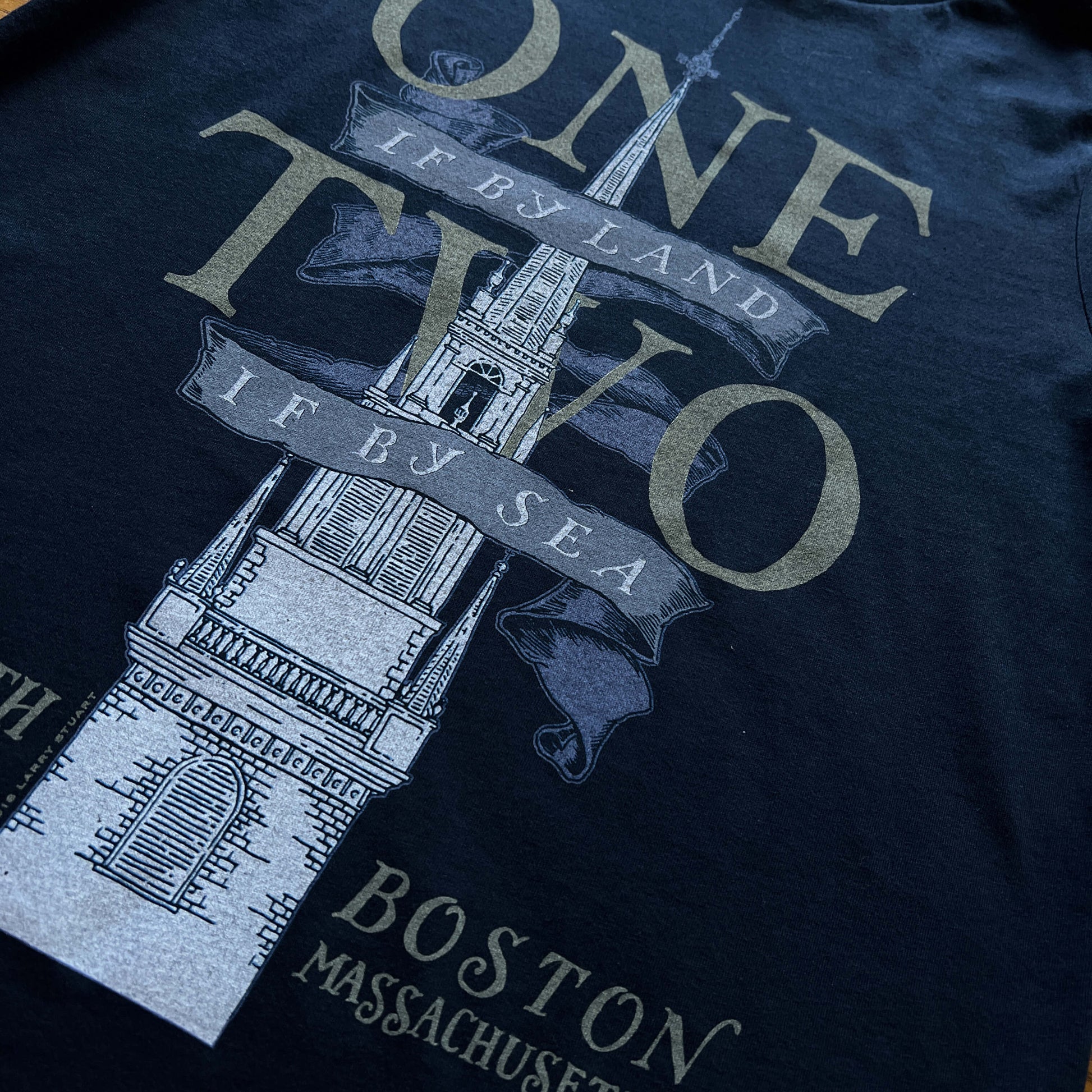 Close-up Navy Blue "One if by land . . ." Old North Special Edition T-shirt in Youth sizes from the history list store