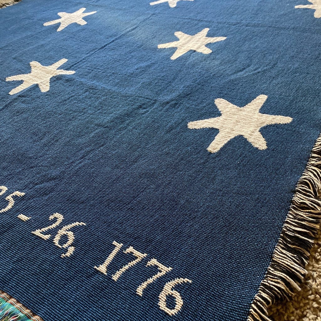Close-up "Victory" blanket woven in the US showing the stars from Washington's HQs flag from the History List Store