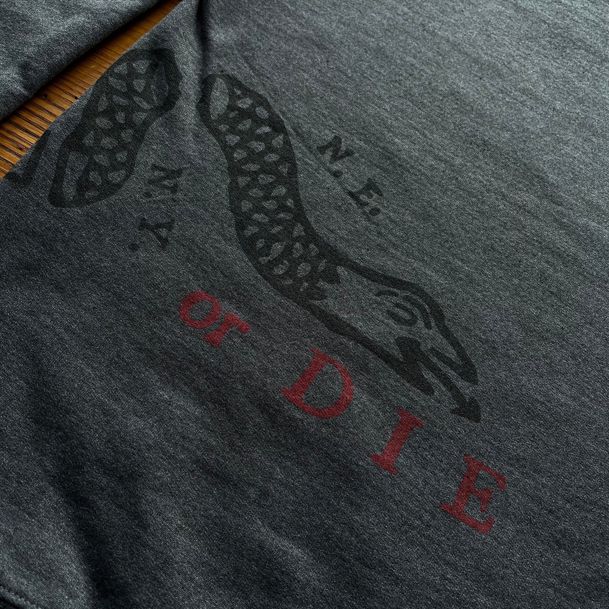 Close-up of Back of "Join or Die" Crewneck sweatshirt from the Light-Blue George Washington from The History List Store.