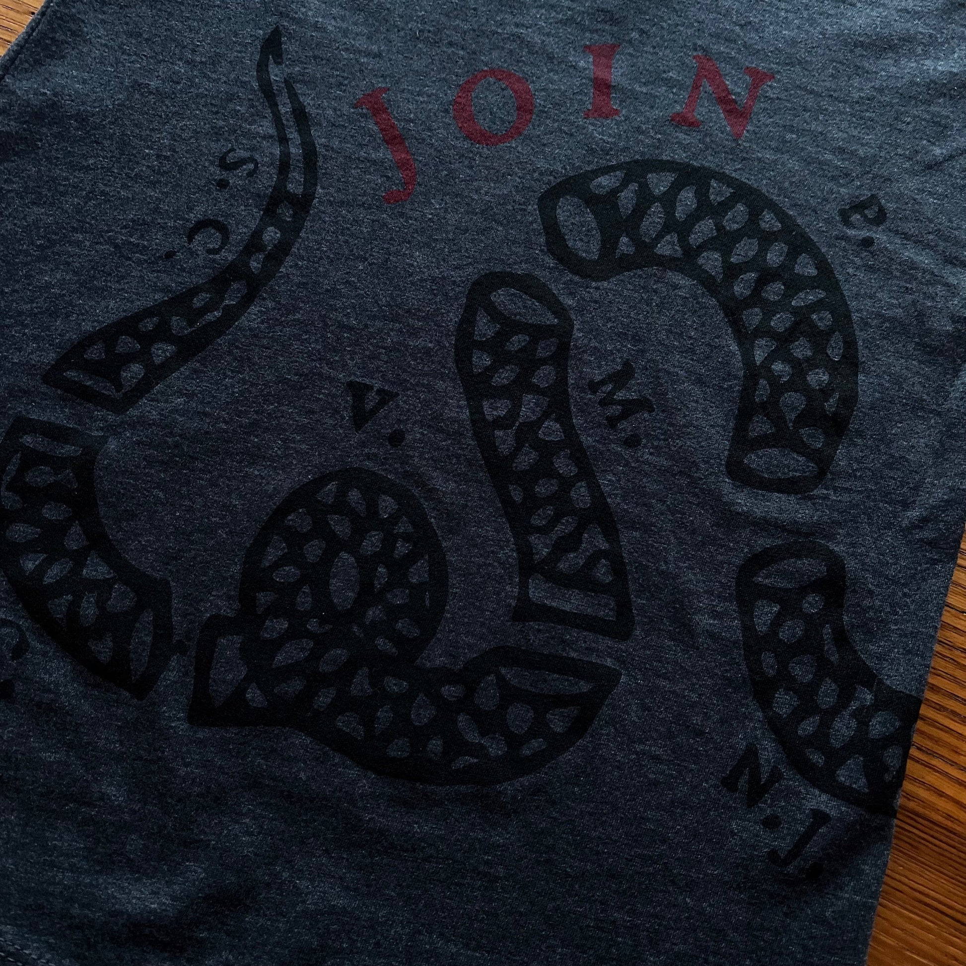 Close-up front of "Join or Die" V-neck shirt - Charcoal grey from the history list store