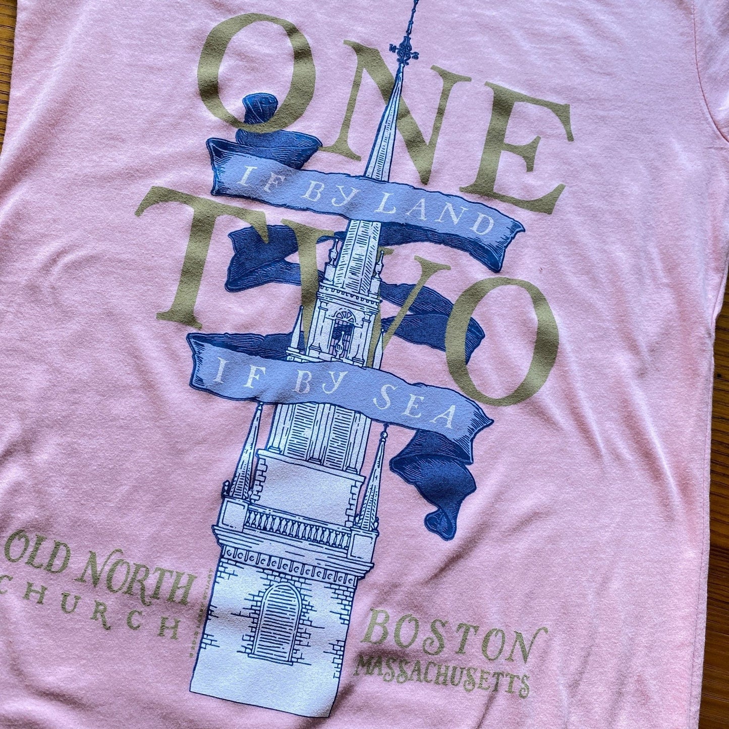 Close-up of Pink "One if by land . . ." Old North Special Edition T-shirt in Youth sizes from the history list store