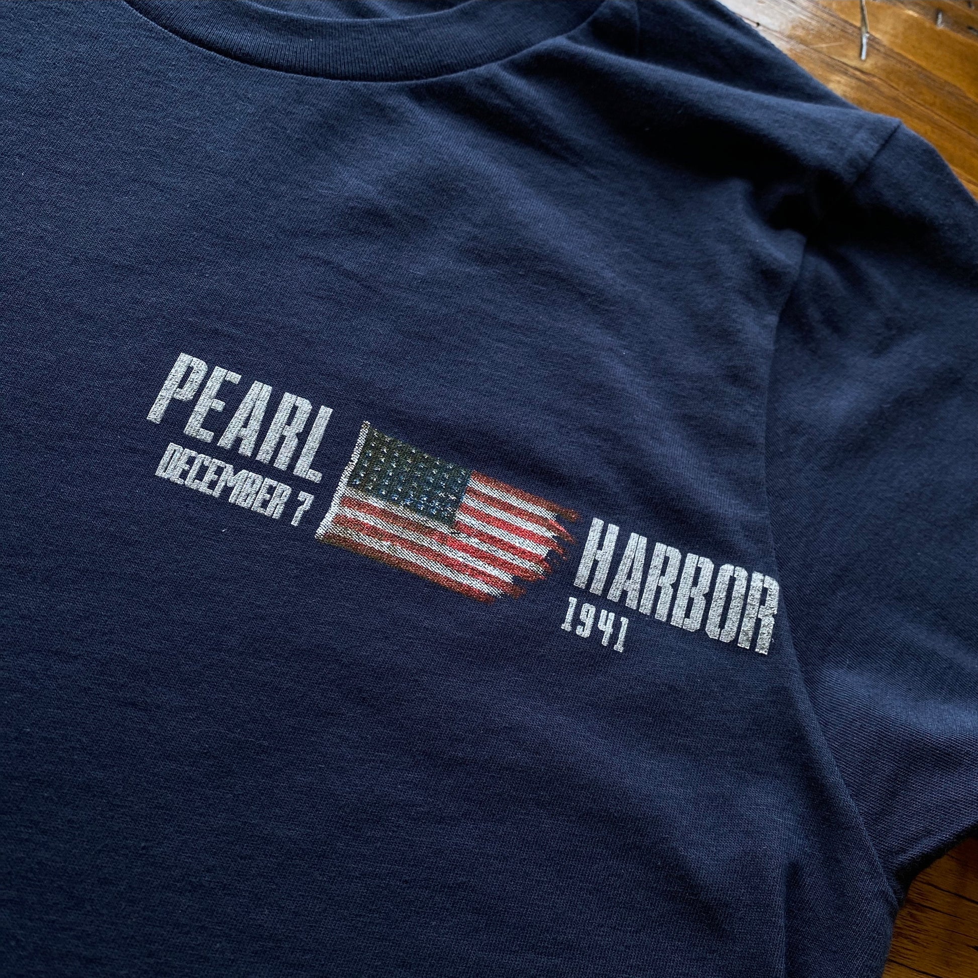 Close-up of front of the Pearl Harbor “Battleship Row” Made in America Shirt from The History List store